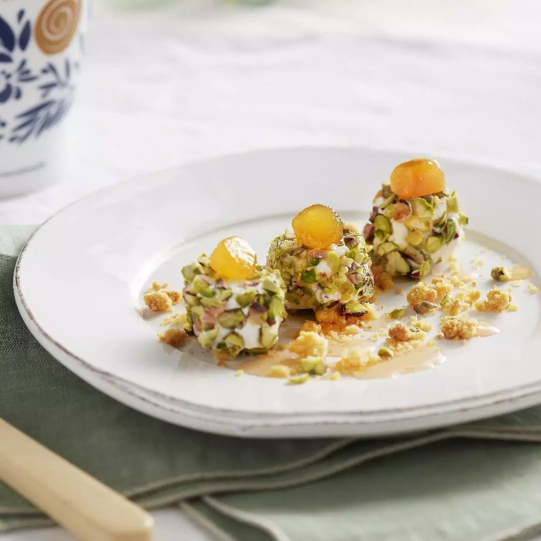 Goat cheese with Zenzero Fabbri and pistachios
